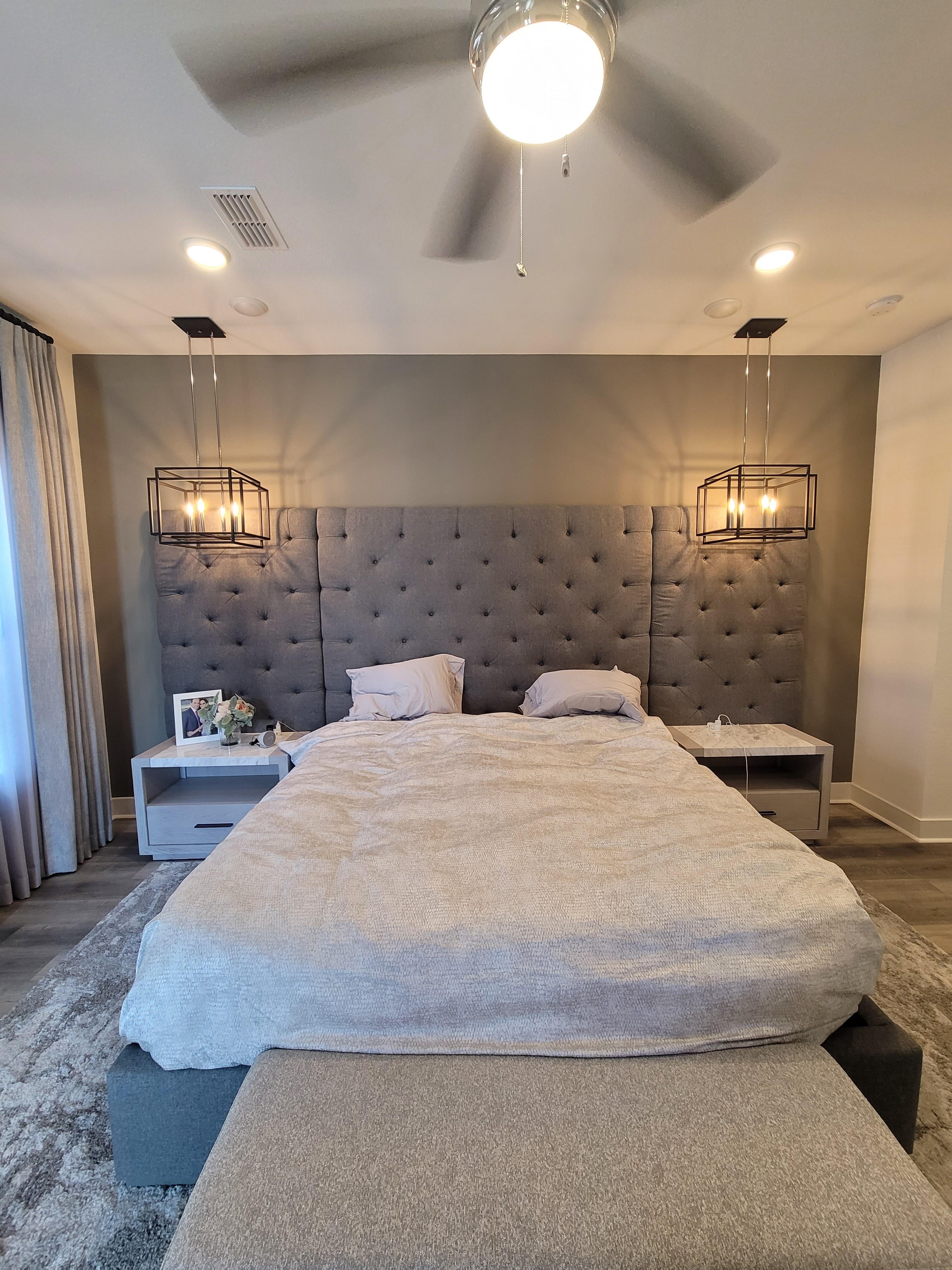 Bedroom with installed pendant lighting, recessed lights, and ceiling fan